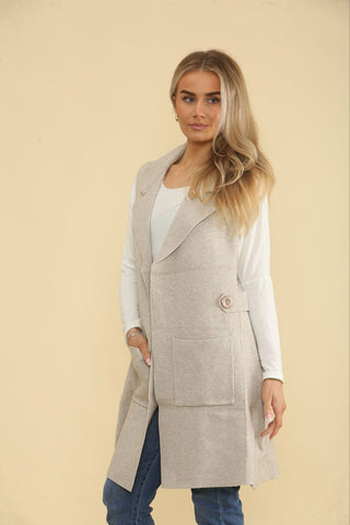 Sleeveless, open-front longline jacket with Notched lapel collar