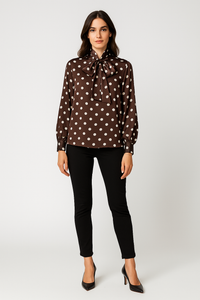 Polka dot bow blouse — silky shine with a bold necktie.