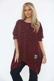 Flowy asymmetric tunic with a bold leopard print and zip-detailed hem