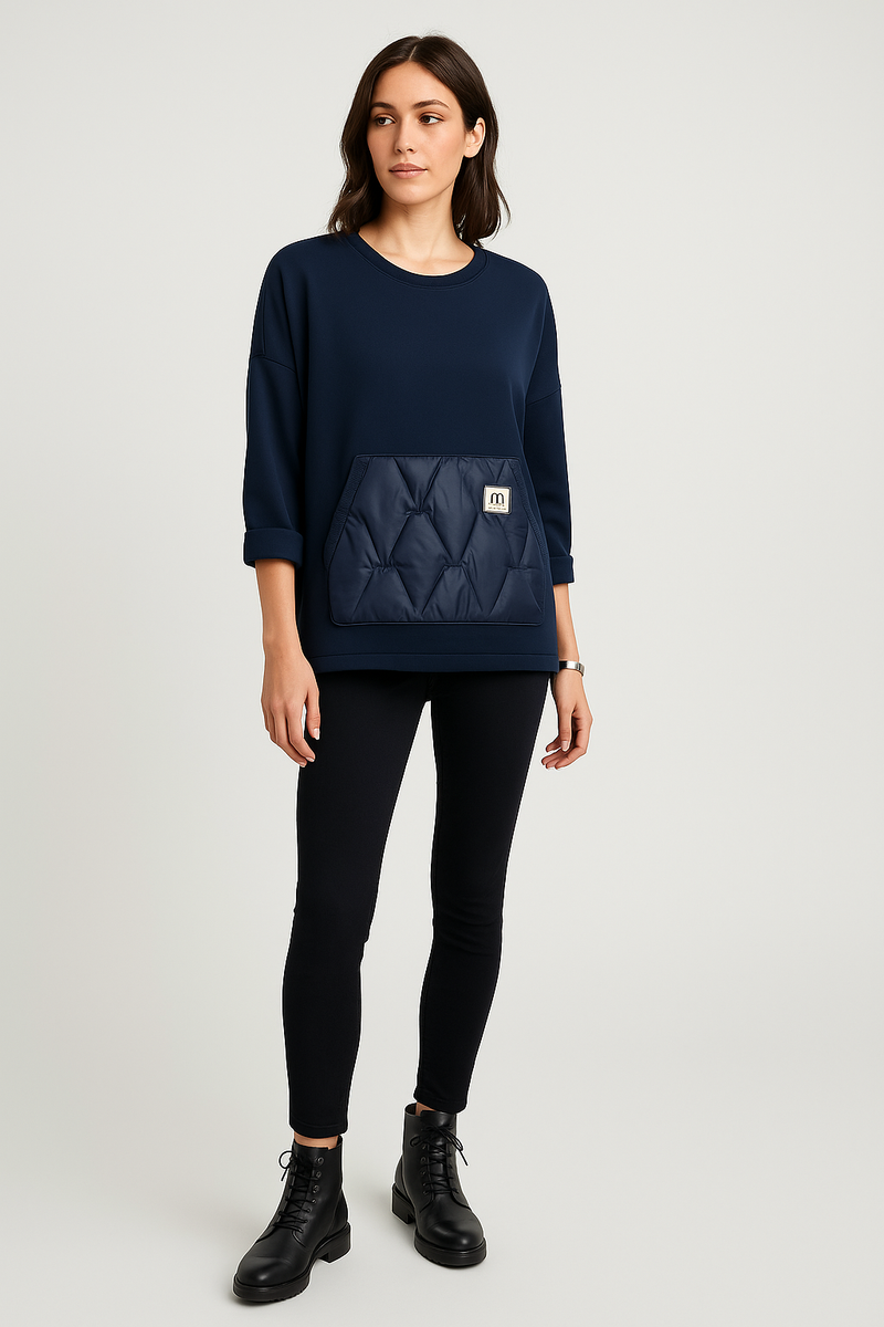 Navy quilt pocket sweatshirt — sporty-chic comfort with a bold textured front detail.