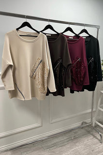 Round neck , long-sleeves Jumper with diagonal sequined panel details