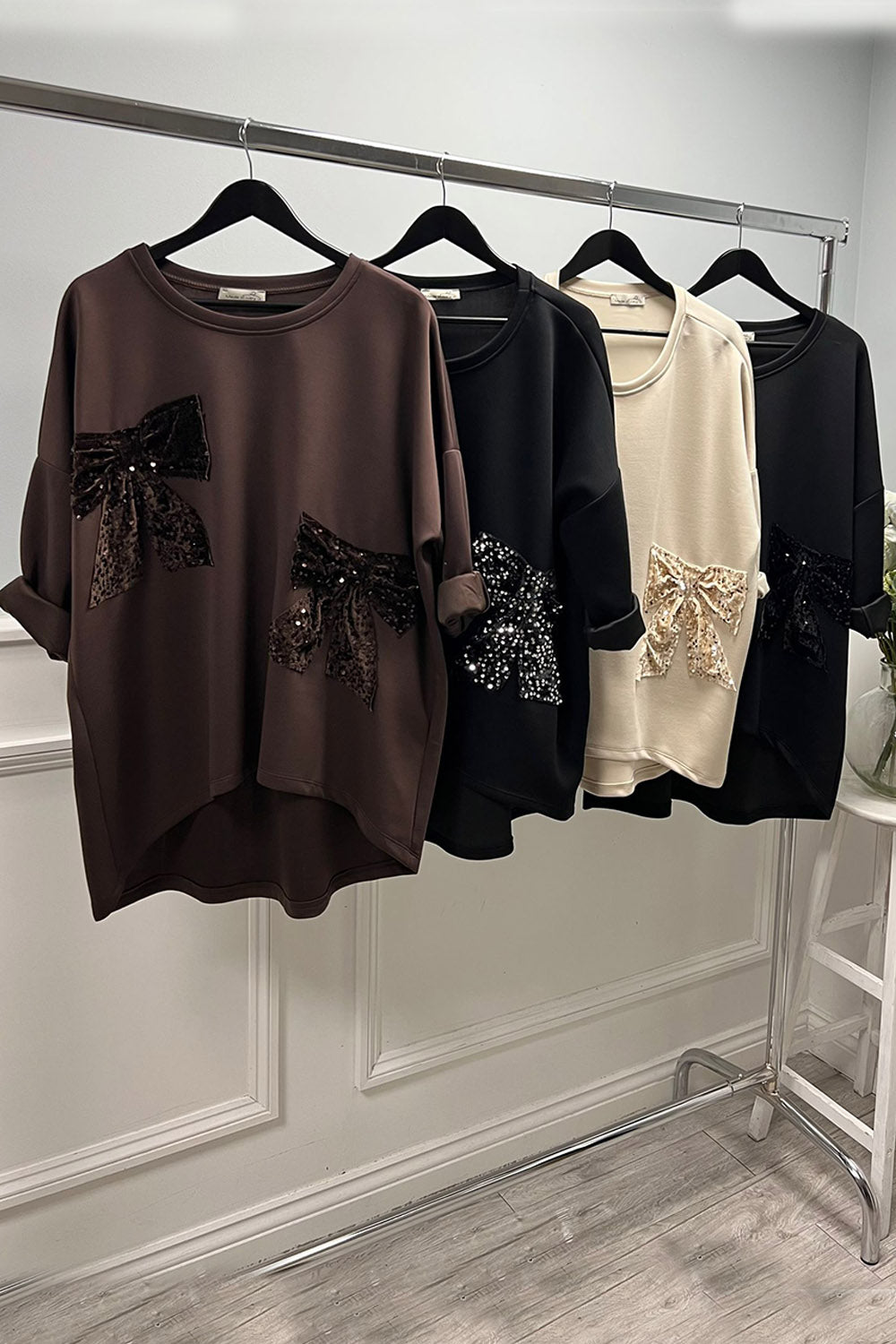 Chocolate bow top — oversized elegance with velvet sequin bows for a luxe statement.