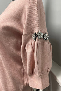 Soft blush knit — puff sleeves with crystal accents