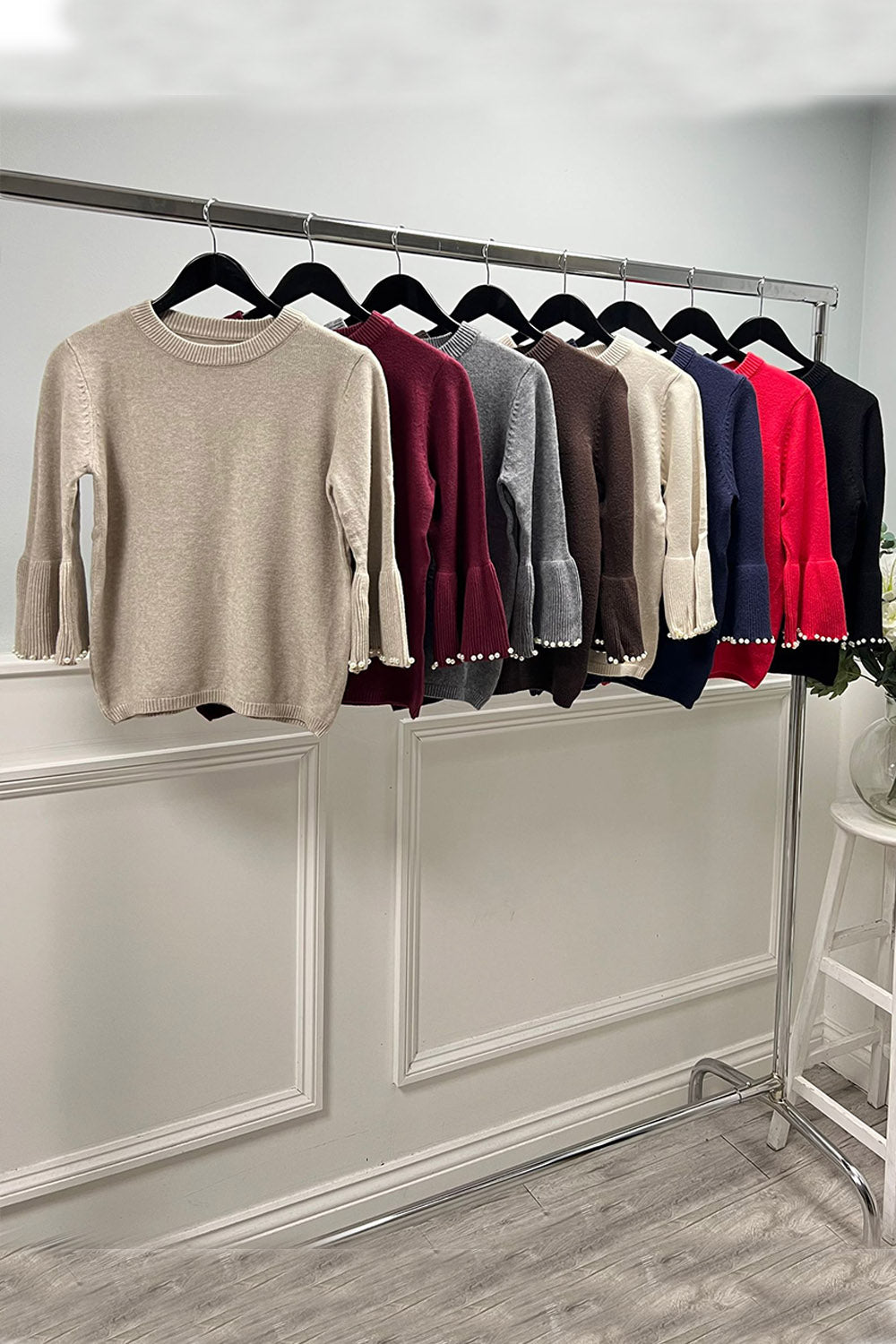 Knitted Jumper with statement flared sleeves detailed with pearl trims