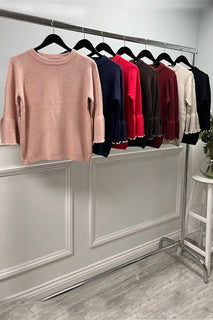Knitted Jumper with statement flared sleeves detailed with pearl trims