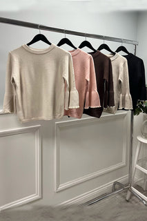 Knitted Jumper with statement flared sleeves detailed with pearl trims