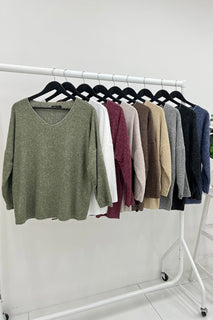 V-Neck , Relaxed fit , Long sleeves ,Knitted Jumper