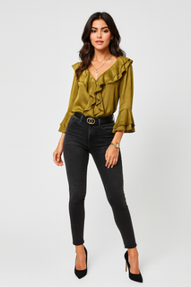 Ruffle Front Blouse features cascading ruffles along the deep V-neckline and sleeve cuffs.&nbsp;
