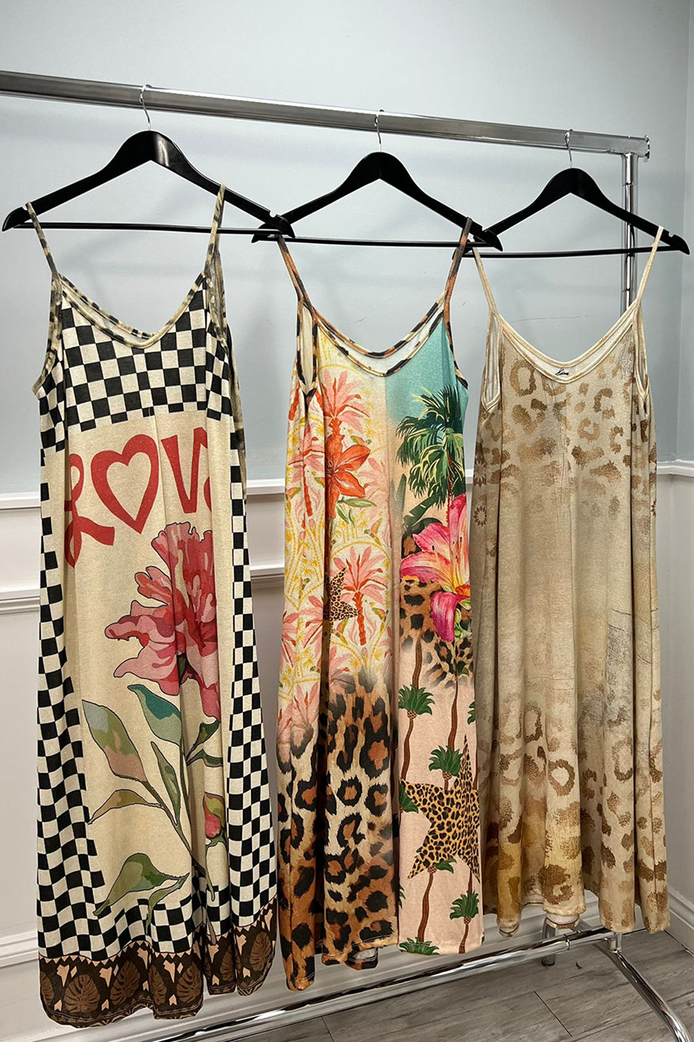 Floral Midi Sundress with a flowy midi length and adjustable spaghetti straps