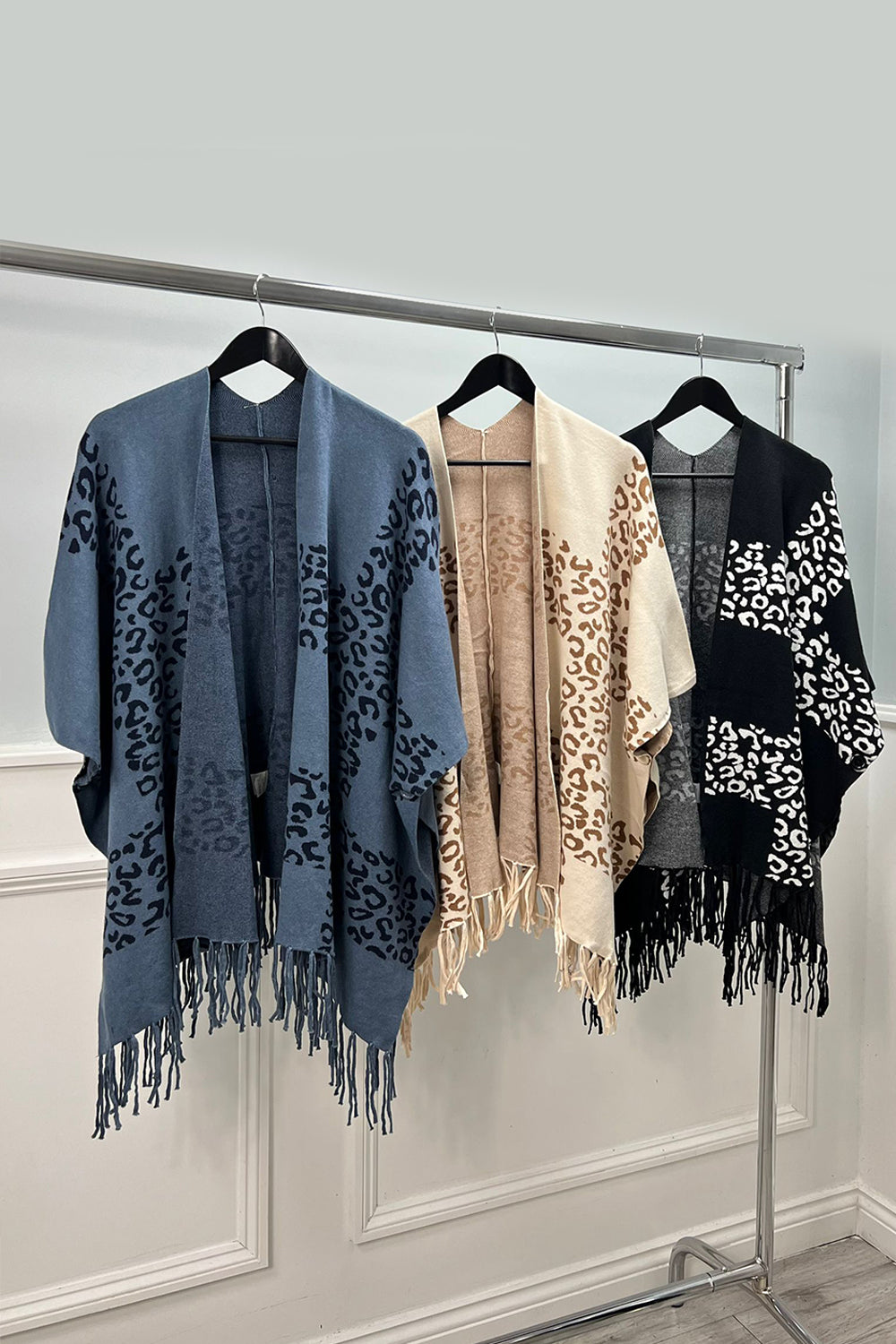Tessel Hem & Button Detailed, Viscose, Nylon & Modal Knitted Poncho. One Size.
