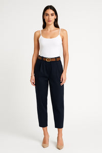 high-waisted tapered fit trousers with a paperbag-style elastic waistband.