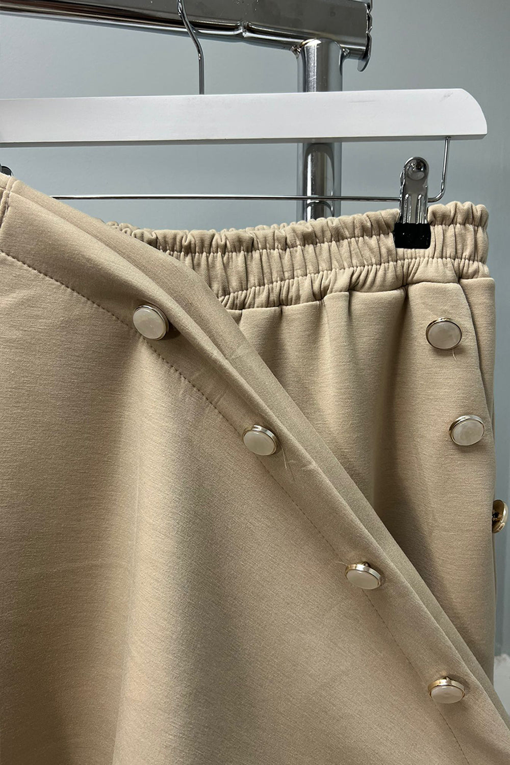 wide-legged relaxed-fit Co-Ords  featuring button detailing along the sleeves