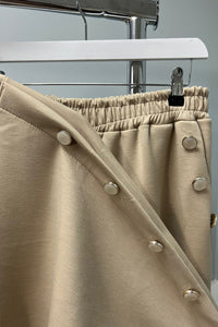wide-legged relaxed-fit Co-Ords  featuring button detailing along the sleeves