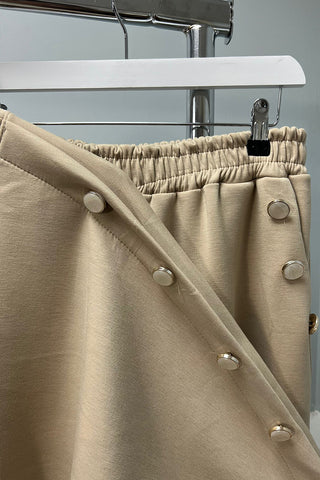 wide-legged relaxed-fit Co-Ords  featuring button detailing along the sleeves