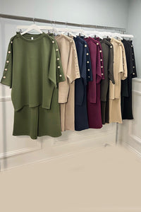 wide-legged relaxed-fit Co-Ords  featuring button detailing along the sleeves