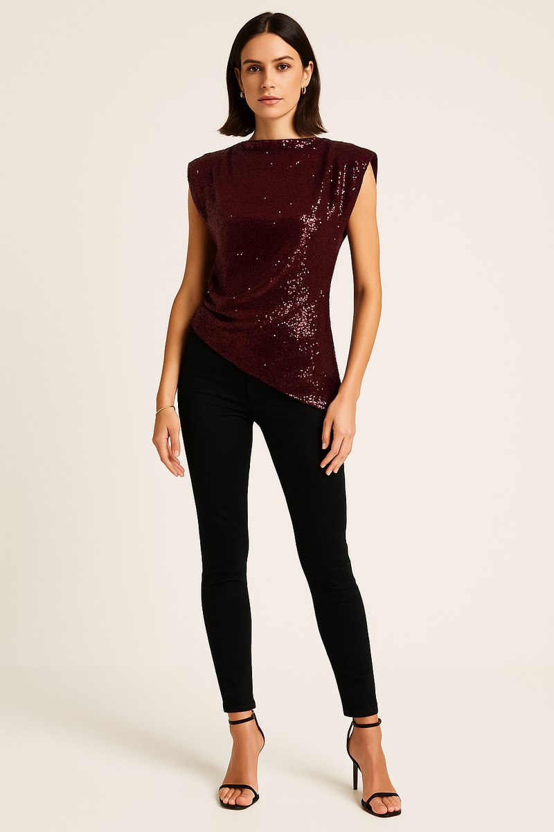 Sleeveless sequin top with padded shoulders and an asymmetric drape hem