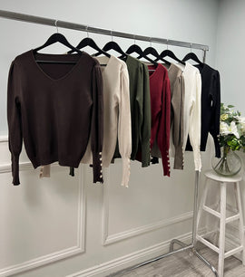V-neck sweater — tailored with soft puff sleeves, ribbed cuffs, and a smooth, clean silhouette 25119
