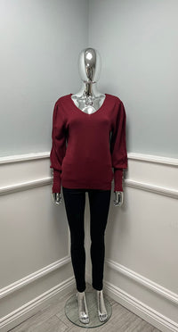 V-neck sweater — tailored with soft puff sleeves, ribbed cuffs, and a smooth, clean silhouette 25119
