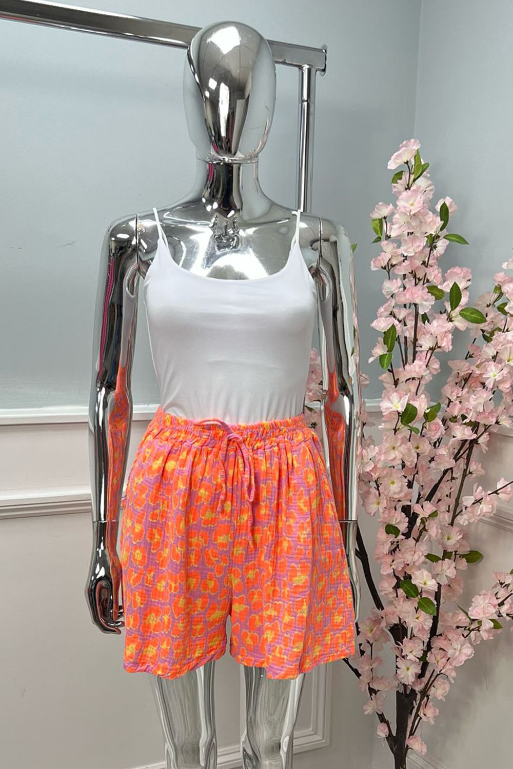 Cheesecloth Printed Two Pocket Neon Shorts.