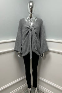 Oversized , V-neck ,knitted jumper with front tie-knot detail