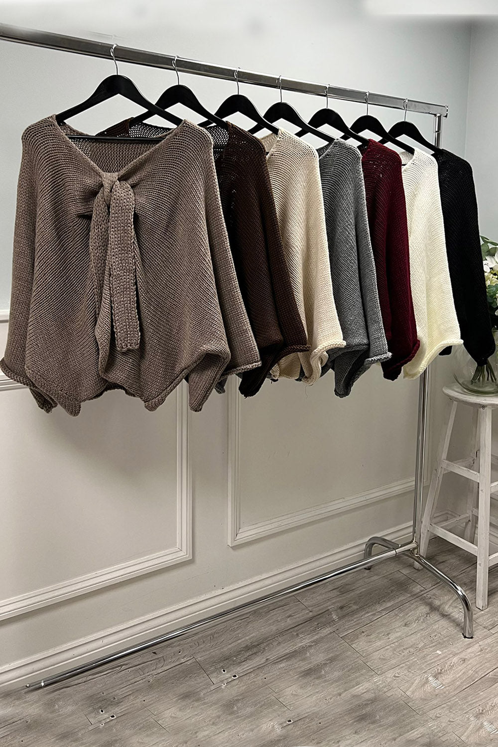 Oversized , V-neck ,knitted jumper with front tie-knot detail