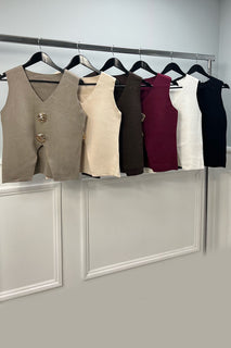 V-neck , sleeveless top with Gold Button