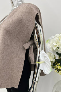 V-neck , sleeveless waistcoat with gold-toned buttons