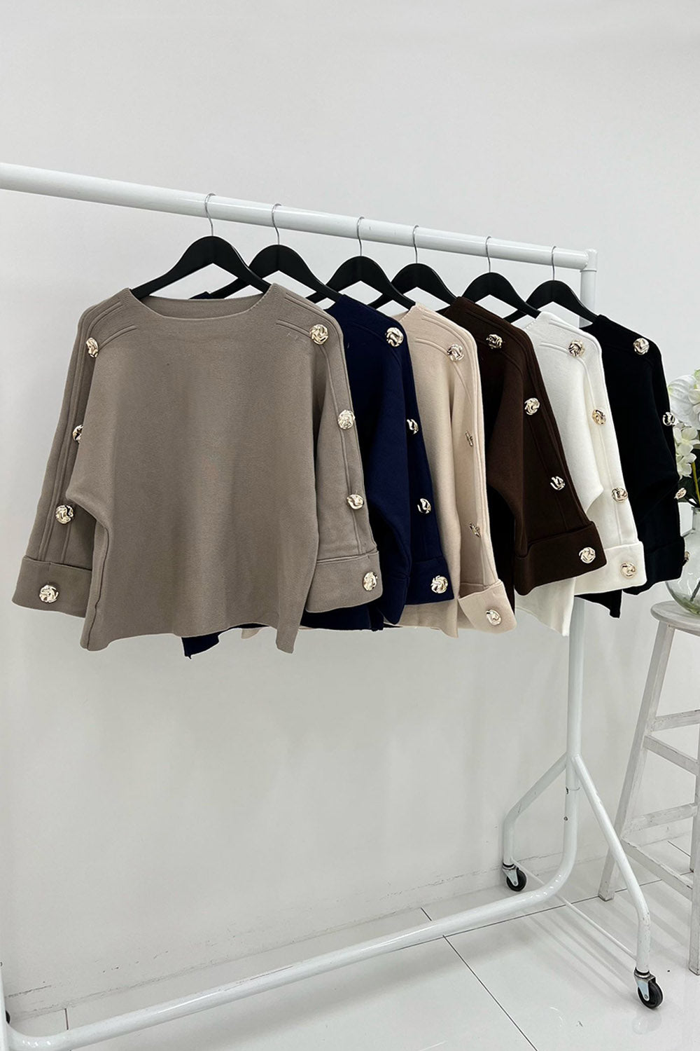 Gold button-detail jumpers