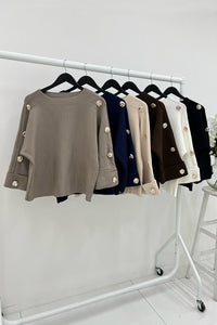 Gold button-detail jumpers