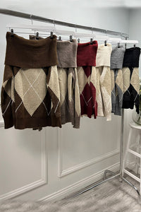 Off-shoulder argyle knit — soft tones, chic neckline