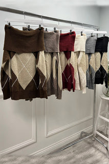 Off-shoulder argyle knit — soft tones, chic neckline