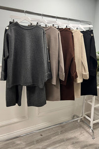 Oversized , long-sleeve Co ords with wide-legged pants & metallic buttons details