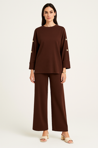 Oversized , long-sleeve Co ords with wide-legged pants & metallic buttons details