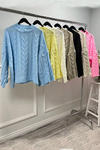 Oversized Cable knit jumper with wide and flared sleeves at the cuffs