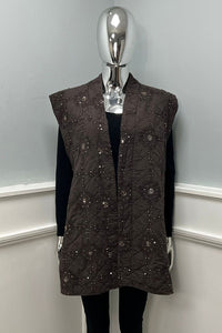 Quilted sleeveless jacket with delicate floral embroidery and sequin detailing