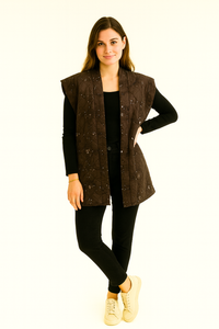 Quilted sleeveless jacket with delicate floral embroidery and sequin detailing