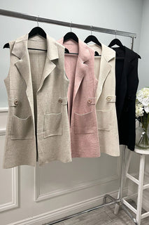 Sleeveless, open-front longline jacket with Notched lapel collar