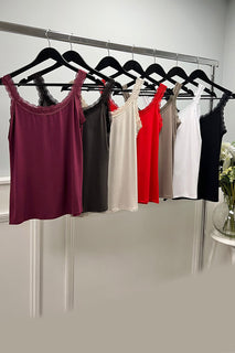 Sleeveless vest with delicate lace trim on Neck & Strap