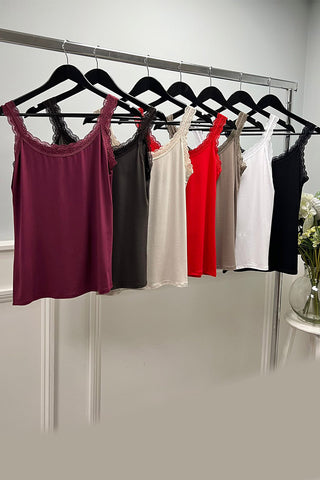 Sleeveless vest with delicate lace trim on Neck & Strap
