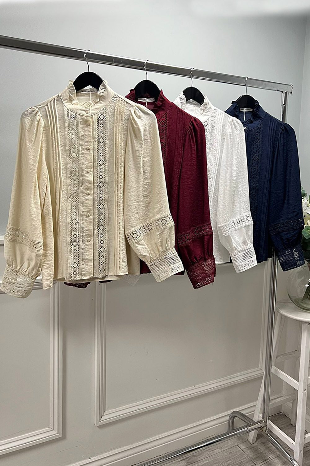 Lace top with pin tuck detailing & a high ruffled collar,  softly puffed sleeves