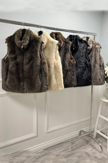 Sleeveless faux fur  jacket with front zipper closure