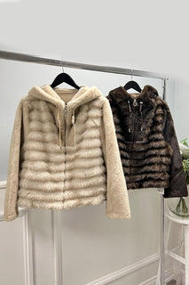 Faux Fur jacket with metallic-detailed drawstrings & circular-zip closure.
