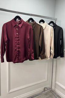 satin-finish button-up shirts featuring a classic collar, statement gold buttons