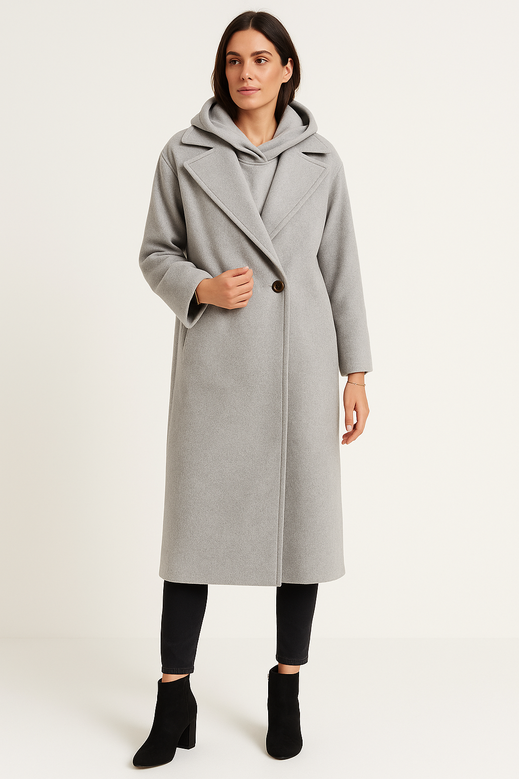 Long tailored coat with wide lapels and a single-button closure