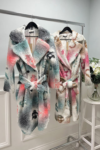 Plush, faux shearling belted coat with wide notched lapel collar, wrap-style front