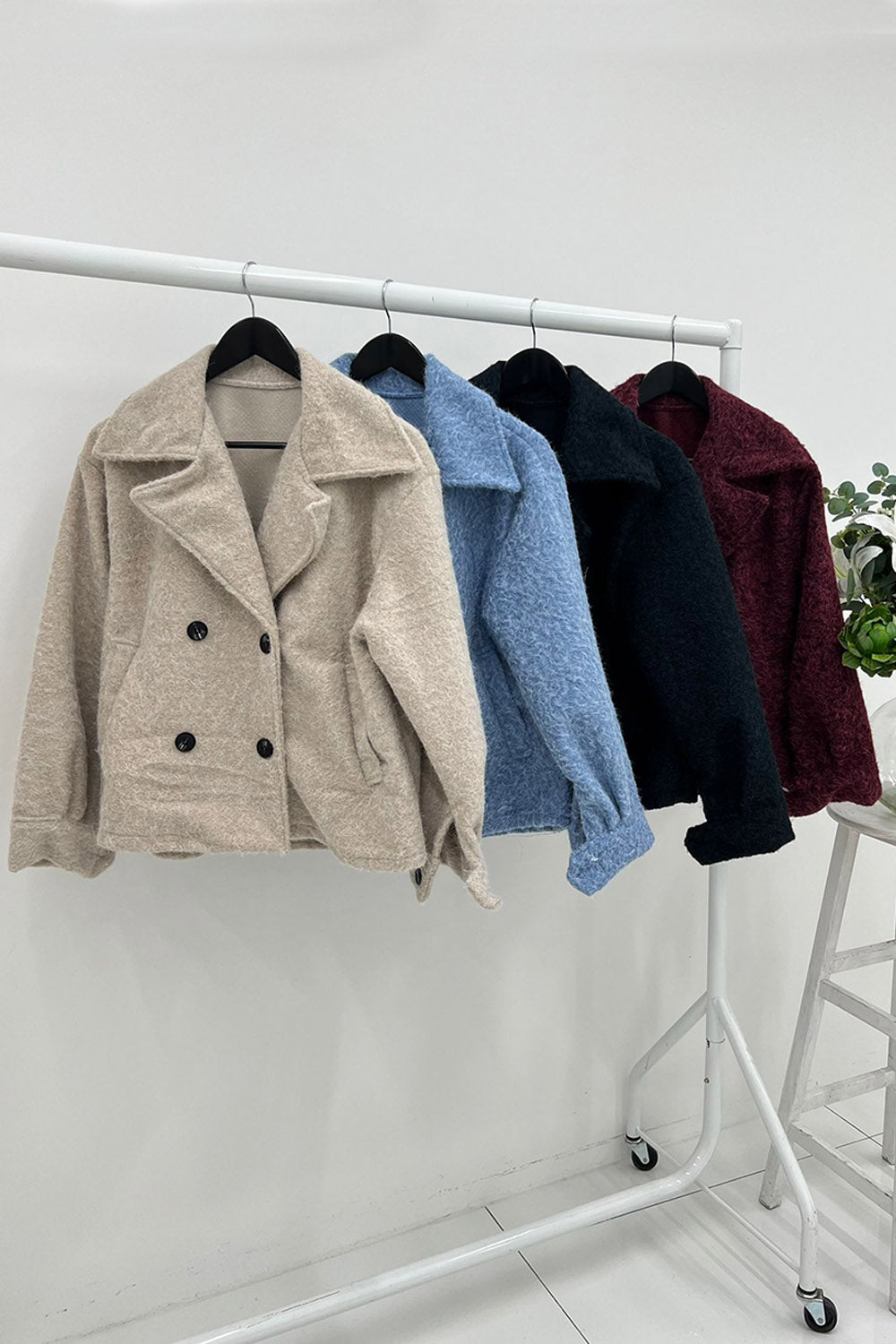 Wide lapel collar, double-breasted button closure Jackets with Side slit pockets