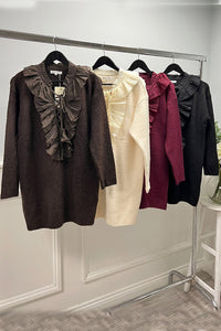 Ruffle-trim knit tunic with lace-up neckline