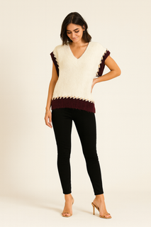 sleeveless knitted jumpers with contrast braided edging