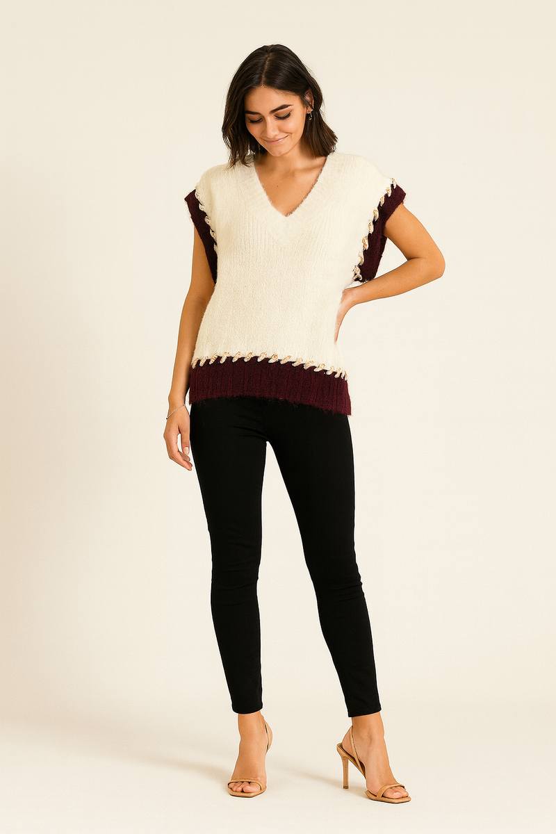sleeveless knitted jumpers with contrast braided edging
