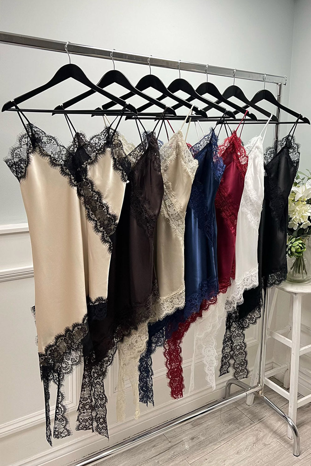V-neck , asymmetrical, satin camisole with delicate spaghetti straps